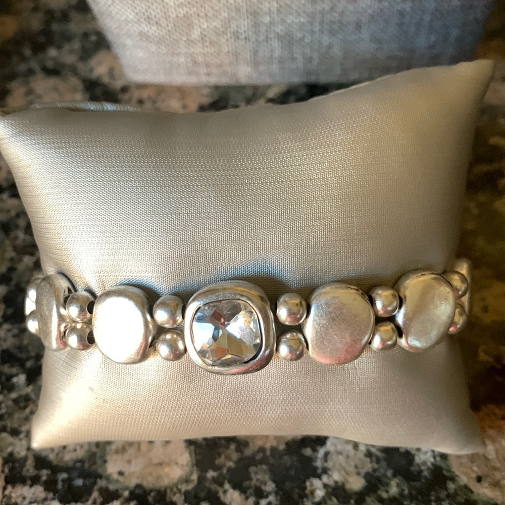 Silver stretch bracelet with crystal center stone